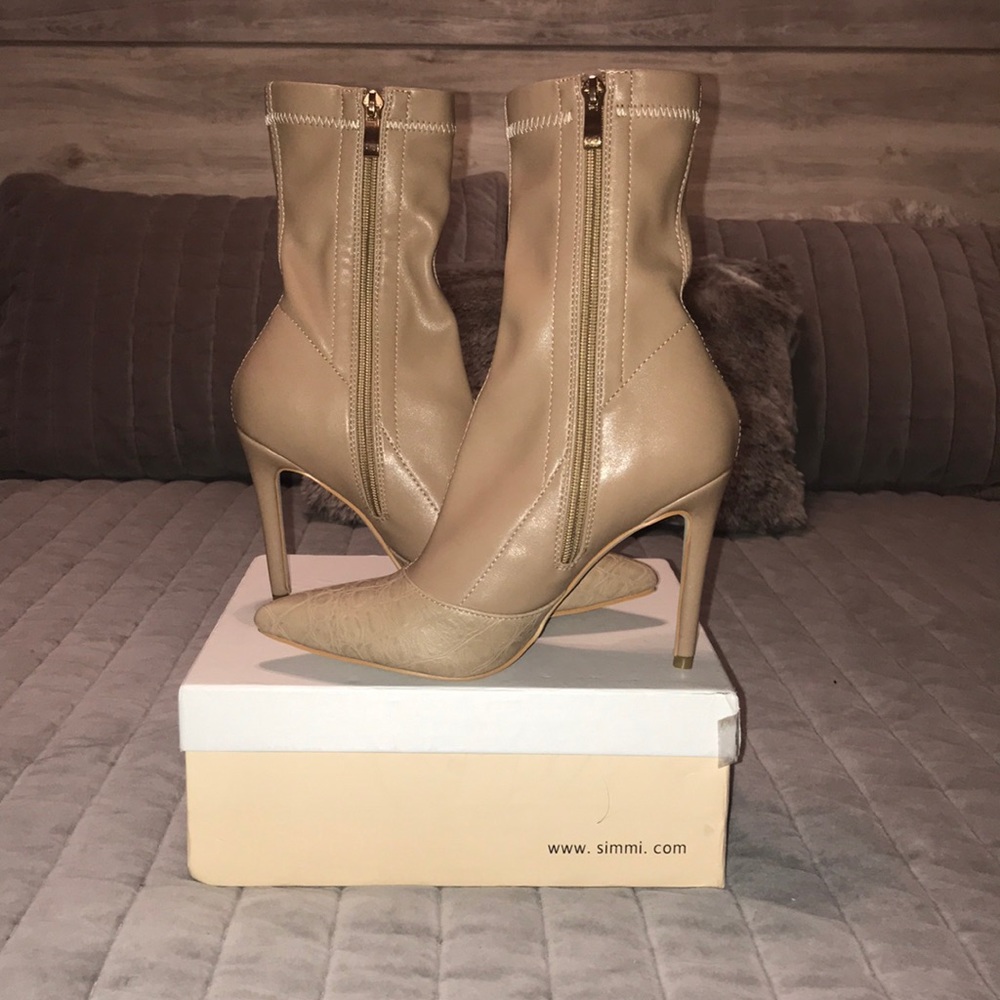 Simmi stiletto boots with crocodile trim.